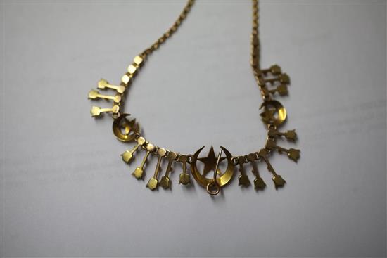 An Edwardian gold and split pearl set fringe necklace, 15in.